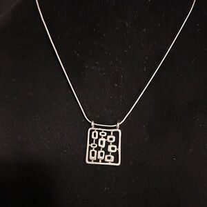Geometric Silver Silver designers stamped Tashi necklace made in Vancouver